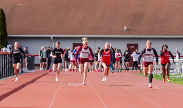 Pine Grove's Aubrey Aungst (Lane 4) و Pine Grove's Viktorya ...