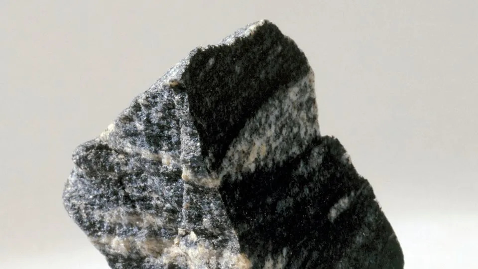 يمثل Acasta Gneiss الحدود بين Hadean Eon والفصل التالي في تاريخ الأرض: The Archean. - مكتبة صور العلوم والمجتمع/Getty Images